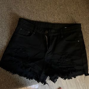 ripped black shorts